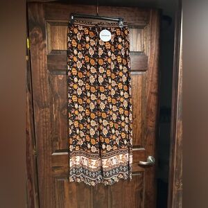 Cute women’s vacation flowy pants, floral patterns, light weight